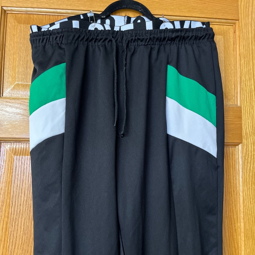 Women Black and Green joggers.